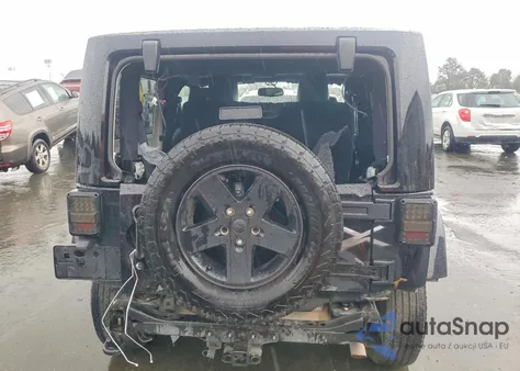 2015 Jeep Wrangler Sahara z USA, uszkodzony, nr VIN 1C4AJWBG9FL616592